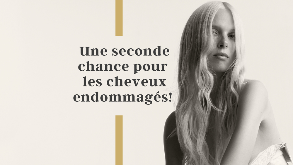 Femme aux longs cheveux blonds ondulés