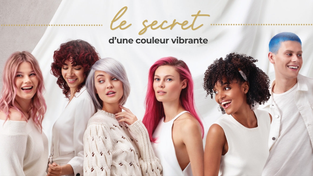 Cinq modèles aux cheveux colorés vibrants posent ensemble, mettant en avant le secret d'une couleur éclatante.